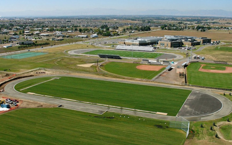 Aerial view of football field and baseball field